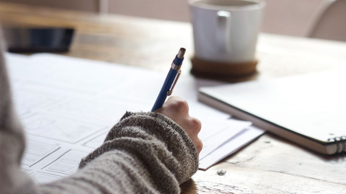 writing at desk